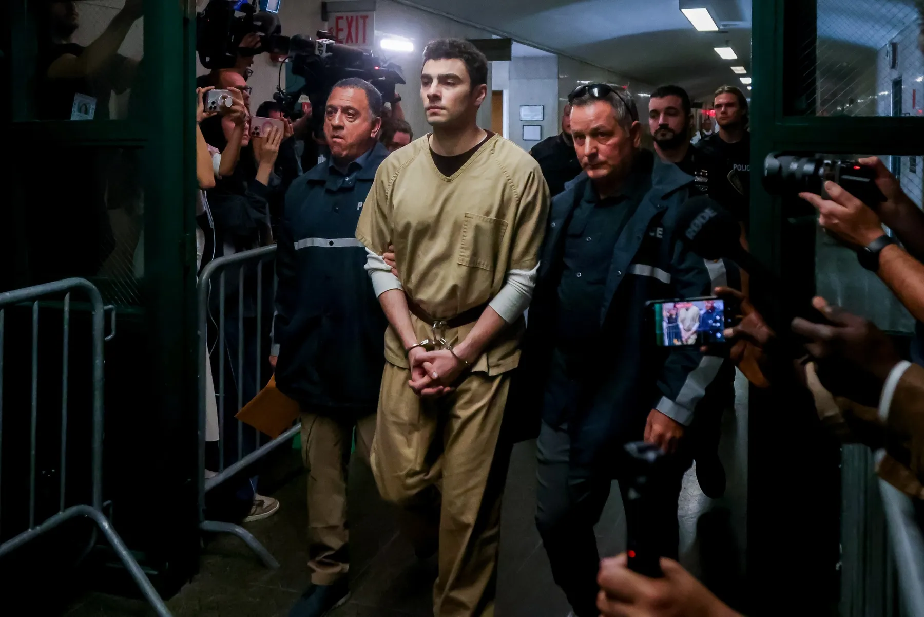 Luigi Mangione during court appearance amid dismissed terrorism charges, latest luigi mangione update on mangione case