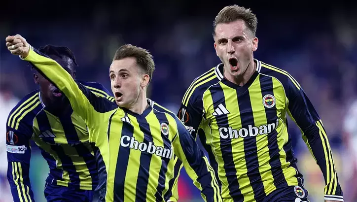 Fenerbahçe players celebrating a goal in Europa League match against Stuttgart.