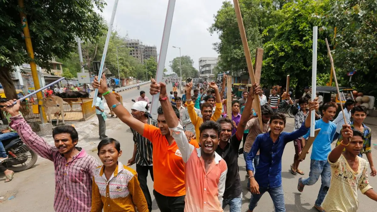 Cow vigilantes attacking a Muslim man