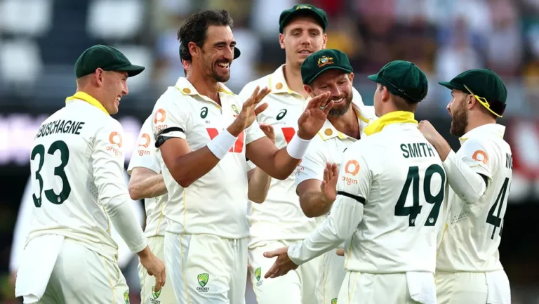 Australian team celebrating a wicket in the Eng vs Aus 2nd Test at the Gabba.