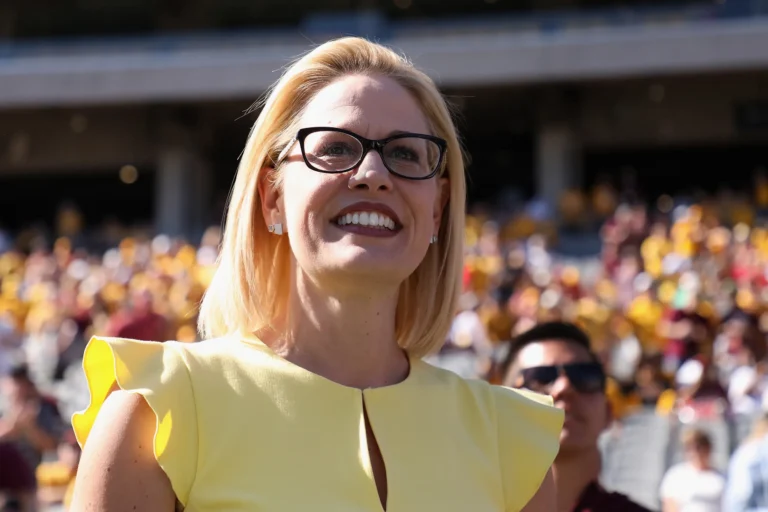 Kyrsten Sinema smiling at a public event in Arizona