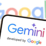 Google Gemini AI logo on a smartphone screen, with “developed by Google” beneath it and blurred Google branding behind.