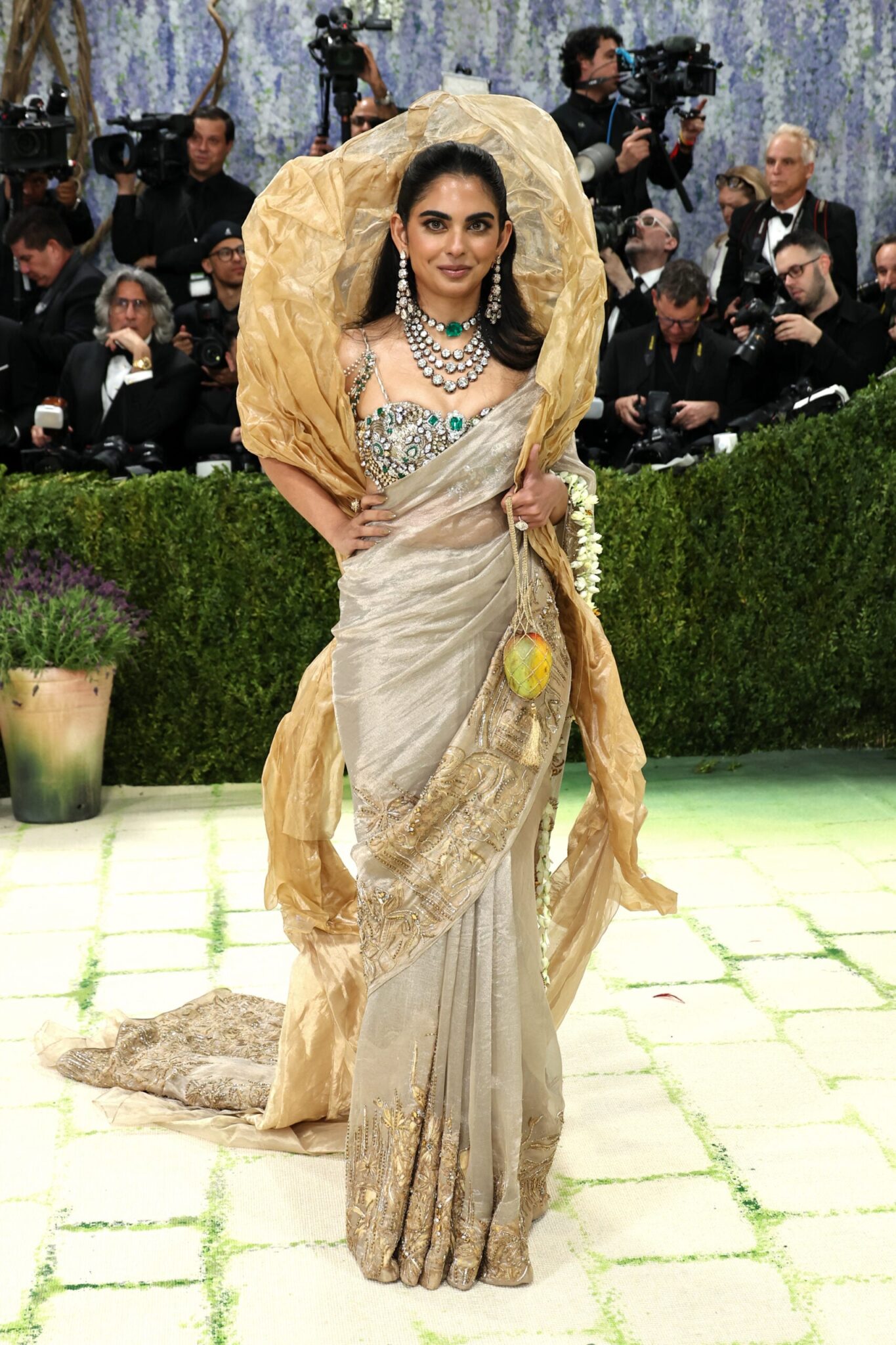 Isha Ambani wearing a custom Gaurav Gupta saree and layered diamond jewelry at the 2026 Met Gala in New York City