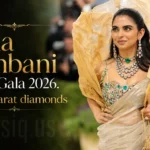 Isha Ambani at Met Gala 2026 wearing a custom gold Gaurav Gupta saree with 1,800 carats of diamonds and emeralds in New York City
